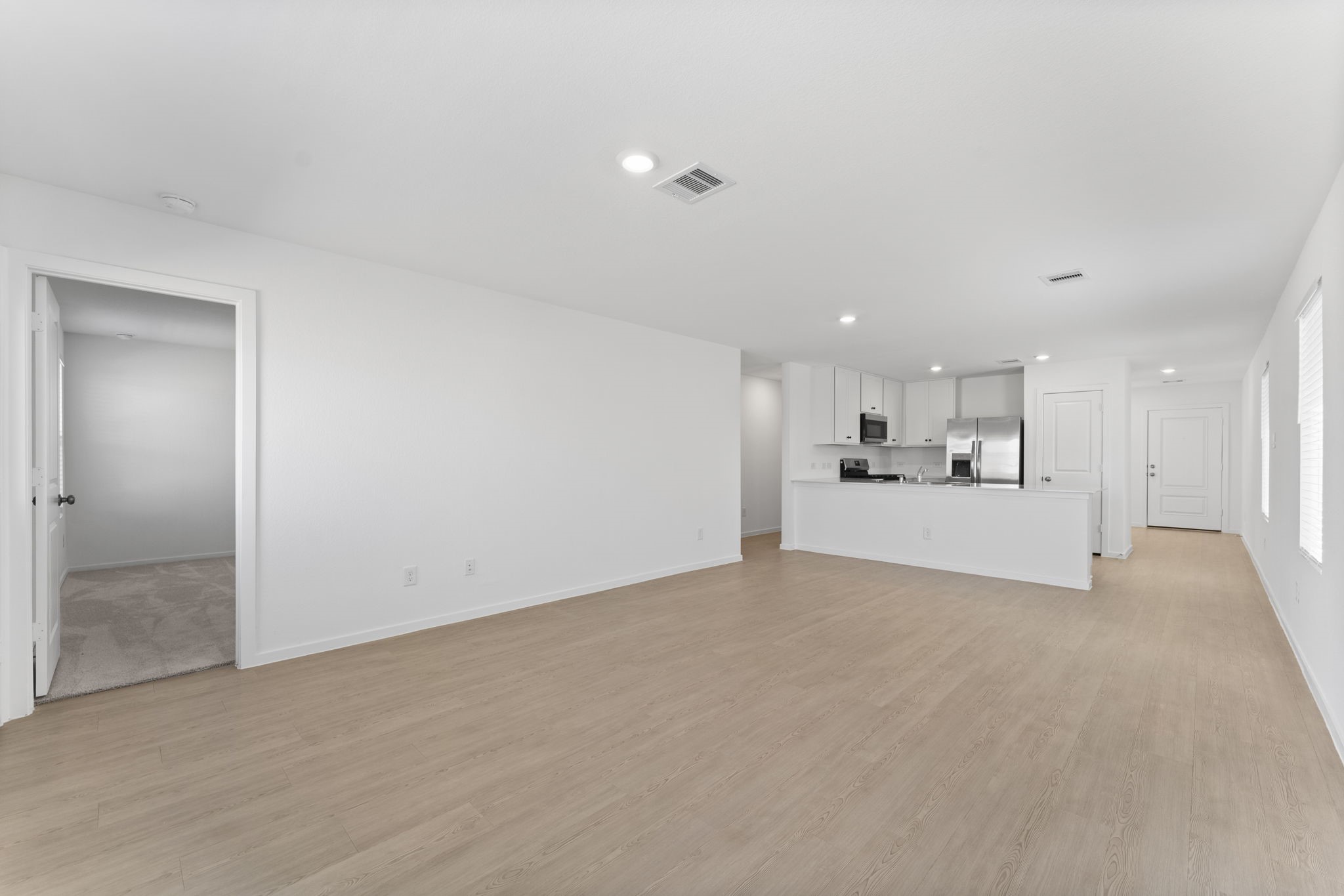 25392 Carnation Court Montgomery, TX 77316 - Photo 11 of 31 a view of a kitchen with a sink and cabinets