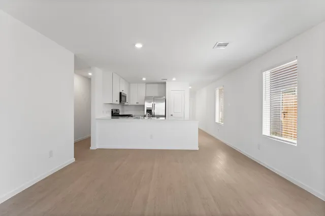 an empty room with windows