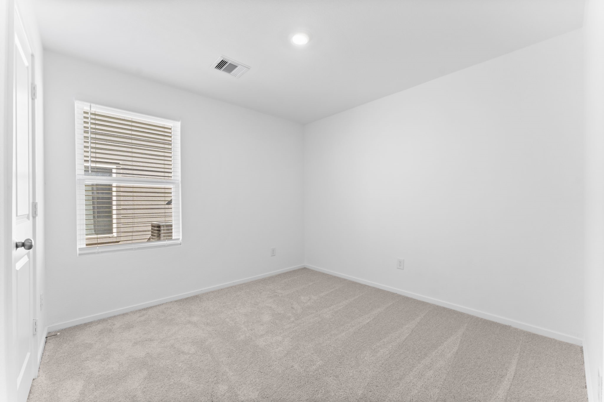 25392 Carnation Court Montgomery, TX 77316 - Photo 18 of 31 an empty room with a window