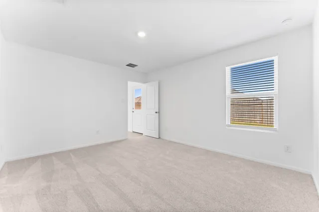 an empty room with an entryway