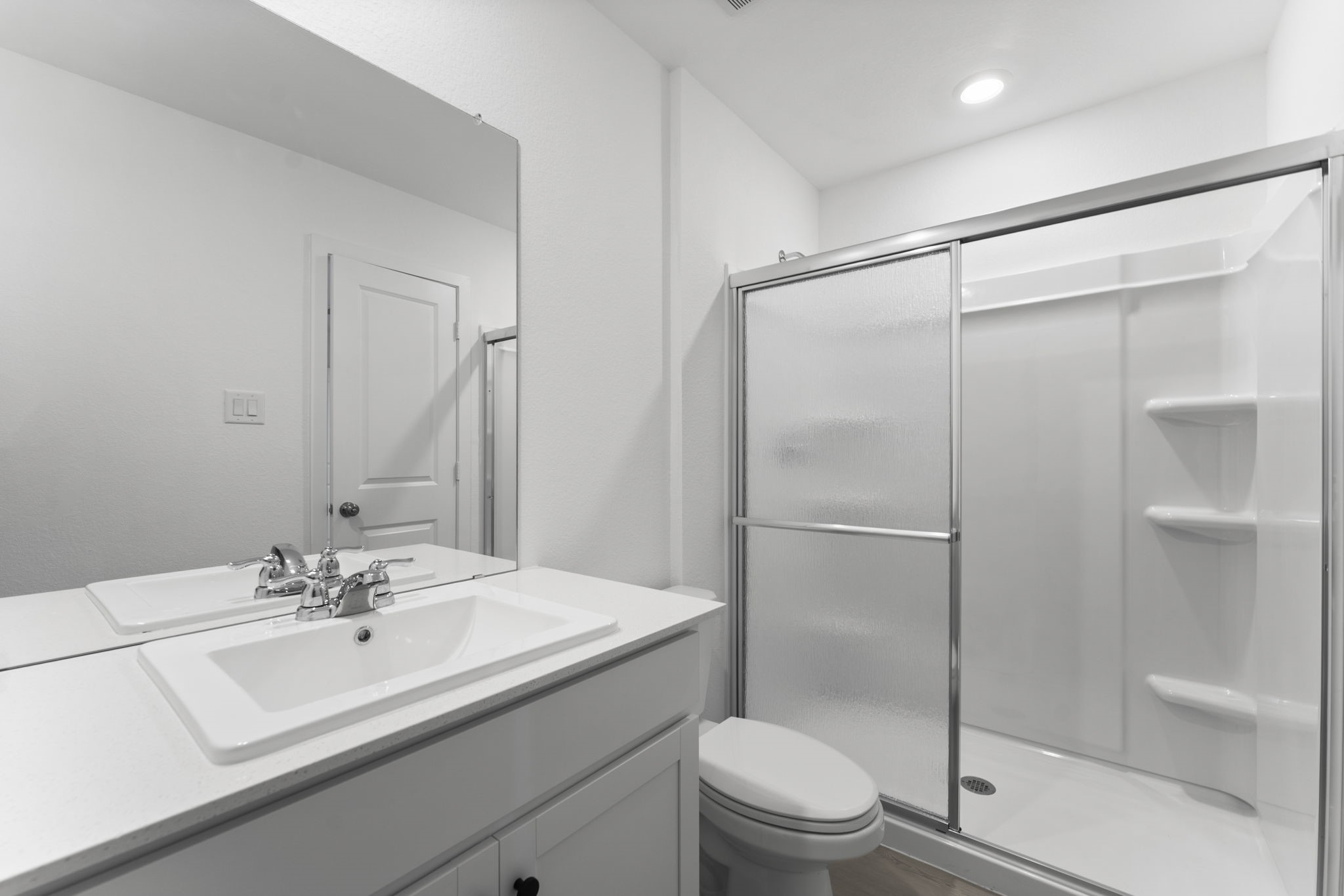 25392 Carnation Court Montgomery, TX 77316 - Photo 25 of 31 a bathroom with a sink toilet and shower