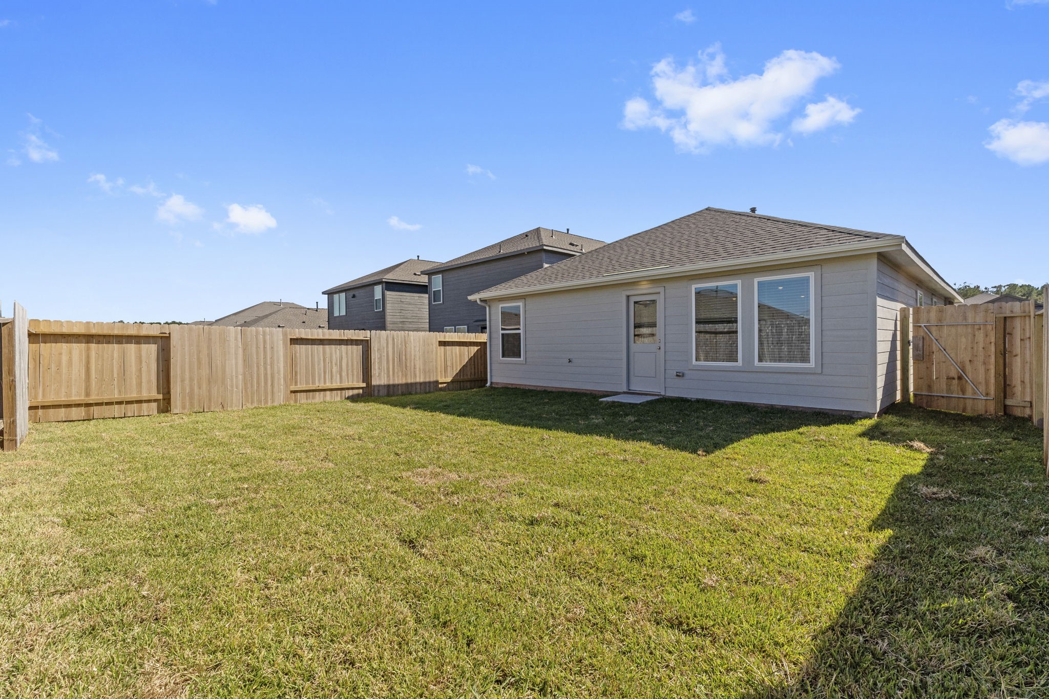 25392 Carnation Court Montgomery, TX 77316 - Photo 27 of 31 a view of a house with a backyard