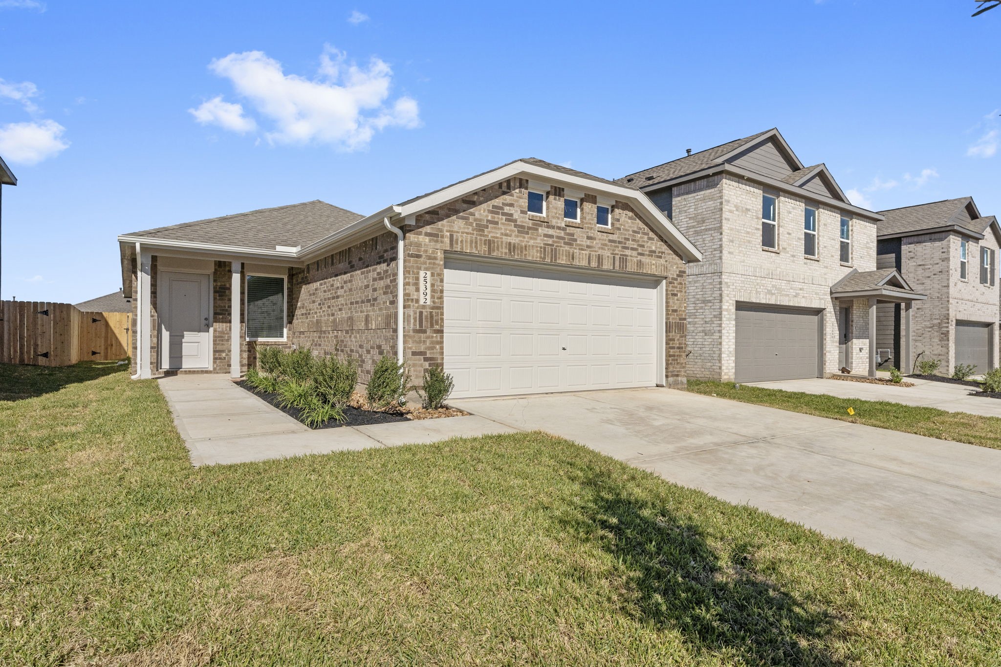 25392 Carnation Court Montgomery, TX 77316 - Photo 3 of 31 a view of a house with a yard and garage