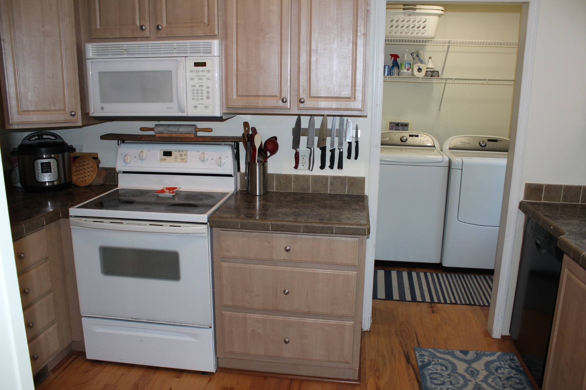 2808 Greer Road Goodlettsville, TN 37072 - Photo 11 of 37 a kitchen with granite countertop white cabinets and white appliances