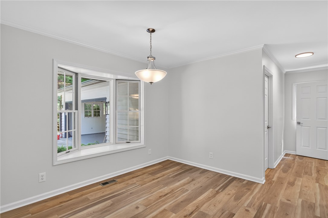 9 Lookout Lane Salem, SC 29676 - Photo 15 of 46 A well-lit interior space features hardwood flooring and an inviting bay window.