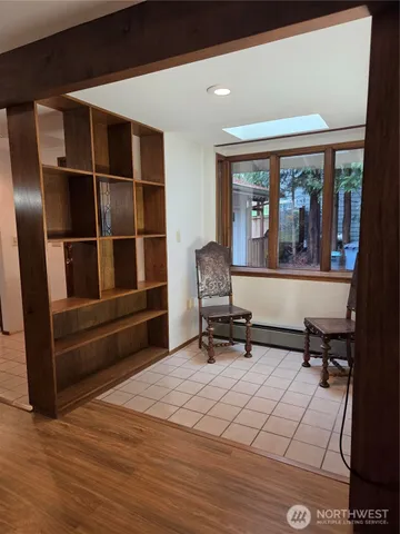 a view of a livingroom with furniture and window