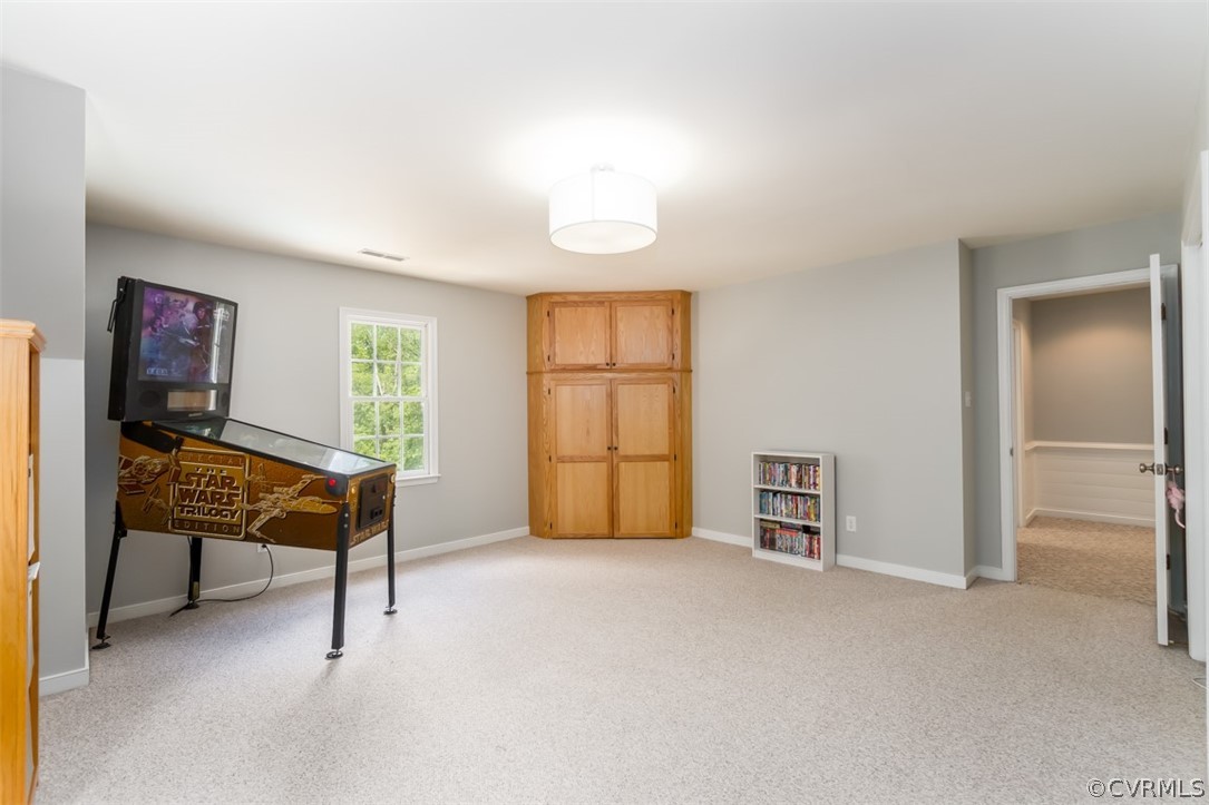 9820 Taylor Road Chesterfield, VA 23838 - Photo 25 of 40 a living room with furniture a bed and a window