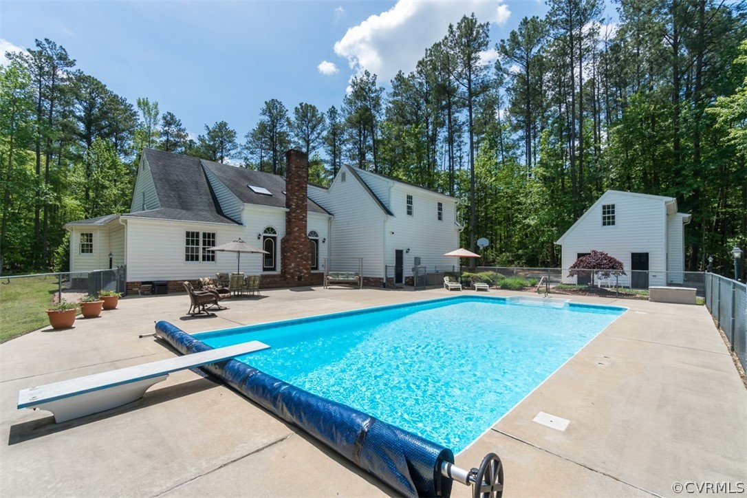 9820 Taylor Road Chesterfield, VA 23838 - Photo 31 of 40 a view of a house with swimming pool and sitting area