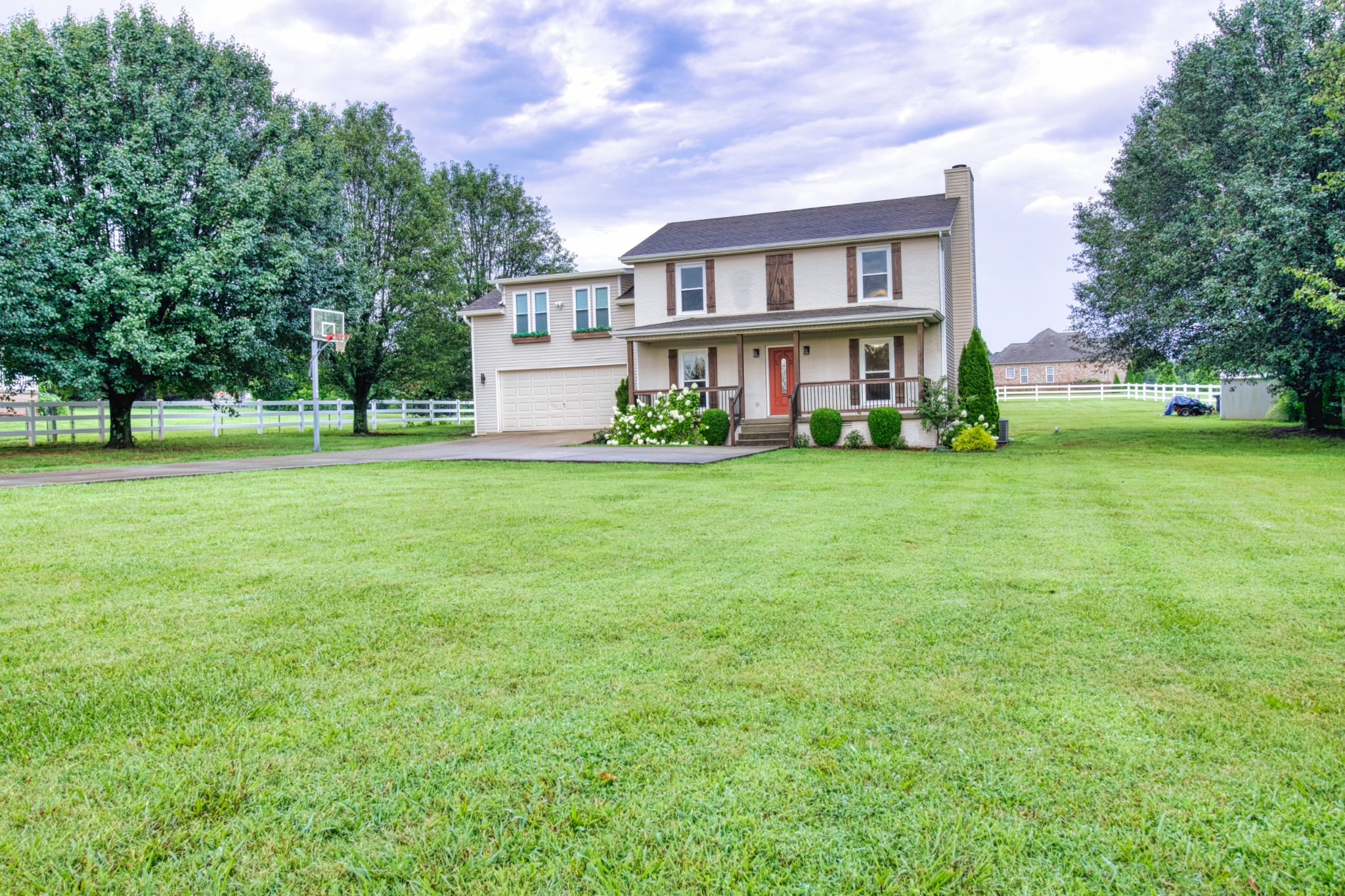 1349 Bates Road Lebanon, TN 37087 - Photo 3 of 29 a view of a house with a big yard and large trees