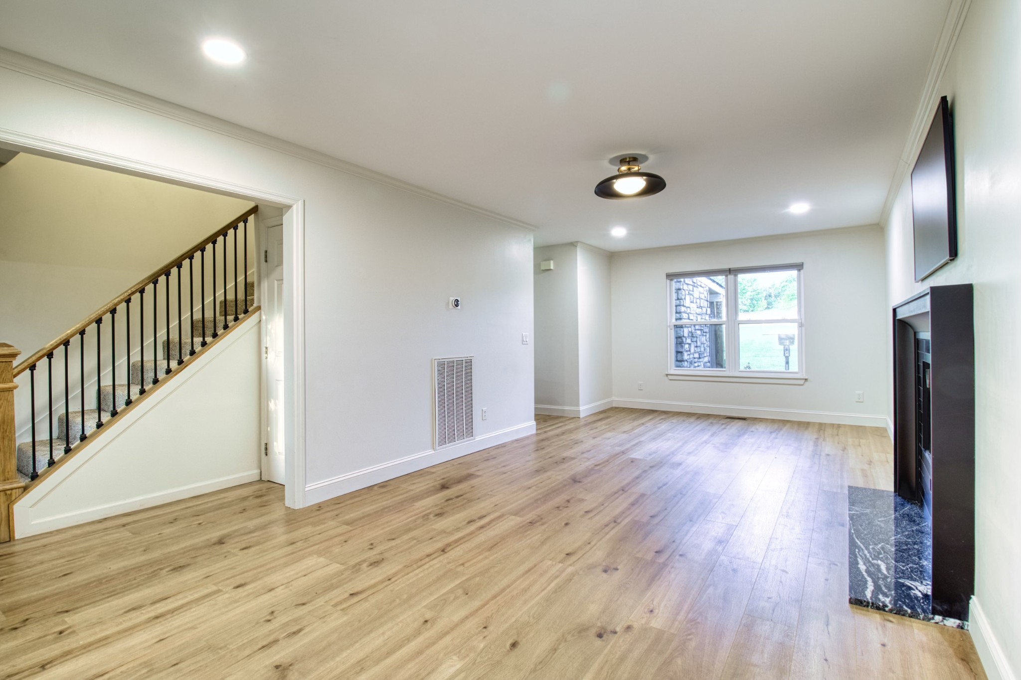 1349 Bates Road Lebanon, TN 37087 - Photo 8 of 29 wooden floor in an empty room with a window