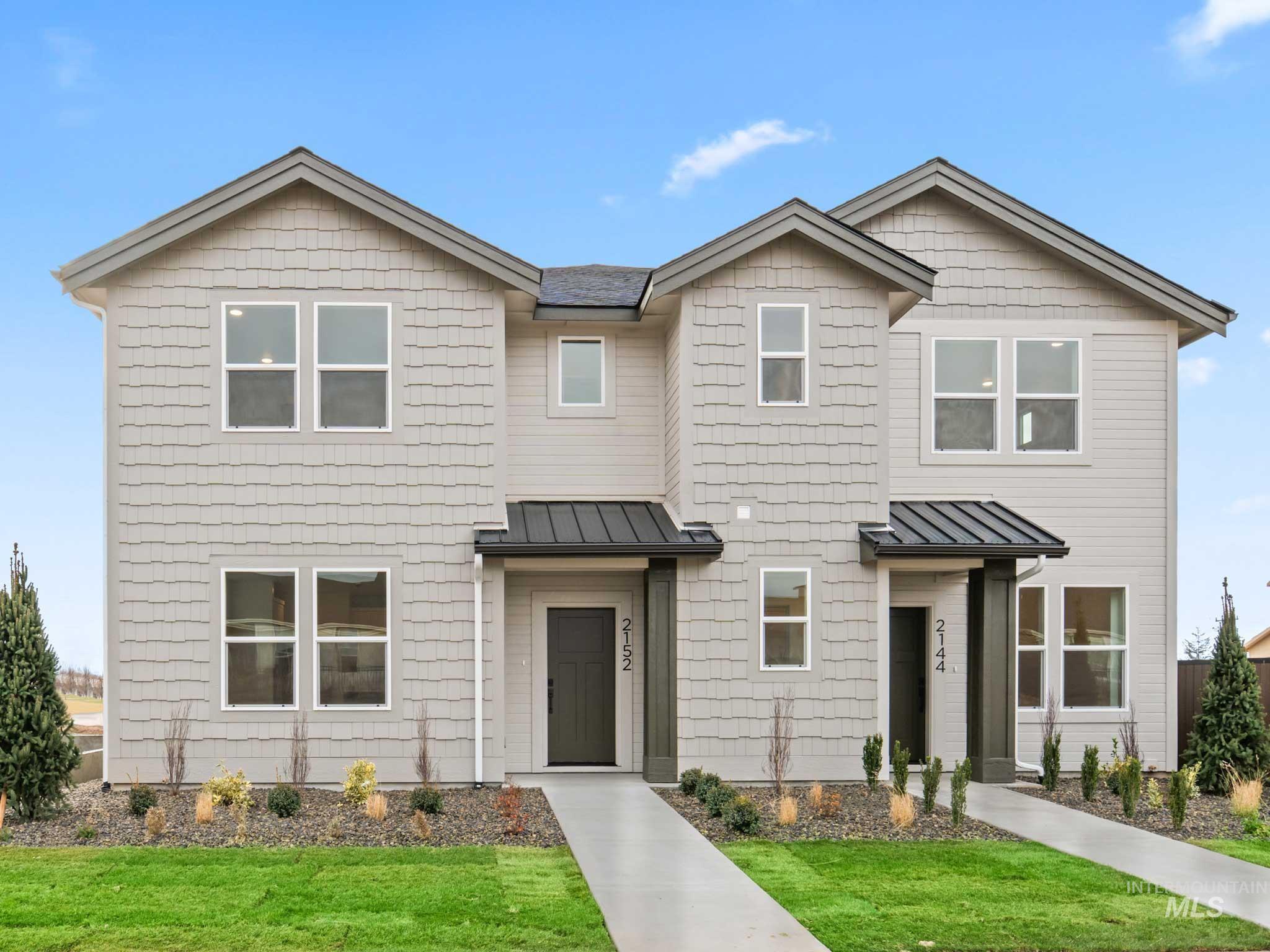 6369 South Sachet Avenue Meridian, ID 83642 - Photo 1 of 13 View of front of home featuring a standing seam roof and a front yard