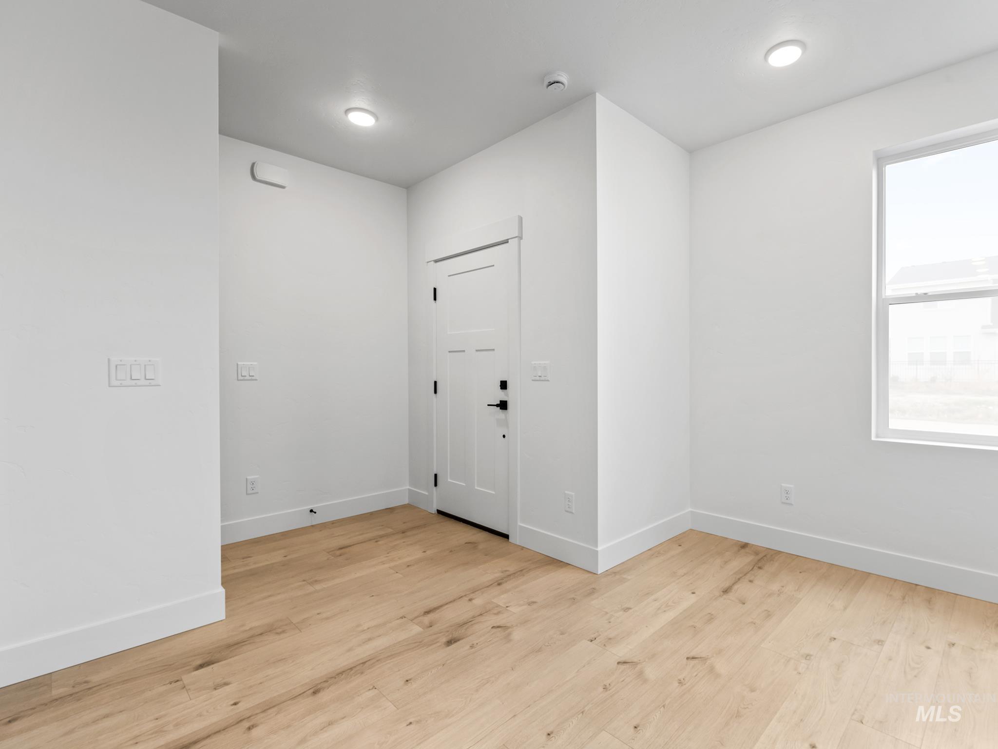 6369 South Sachet Avenue Meridian, ID 83642 - Photo 6 of 13 Entryway featuring light wood-type flooring