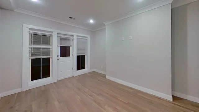 an empty room with windows