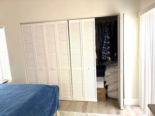 a view of livingroom with furniture and a window