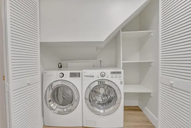 a utility room with dryer and washer