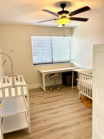 a work place with a table and chairs