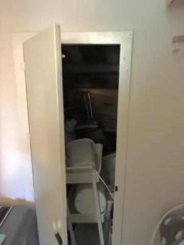 a view of swimming pool with chairs