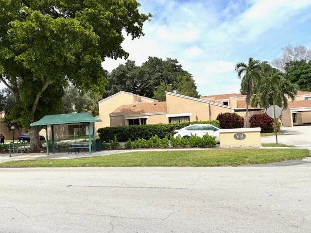 a view of a hallway with storage and utility