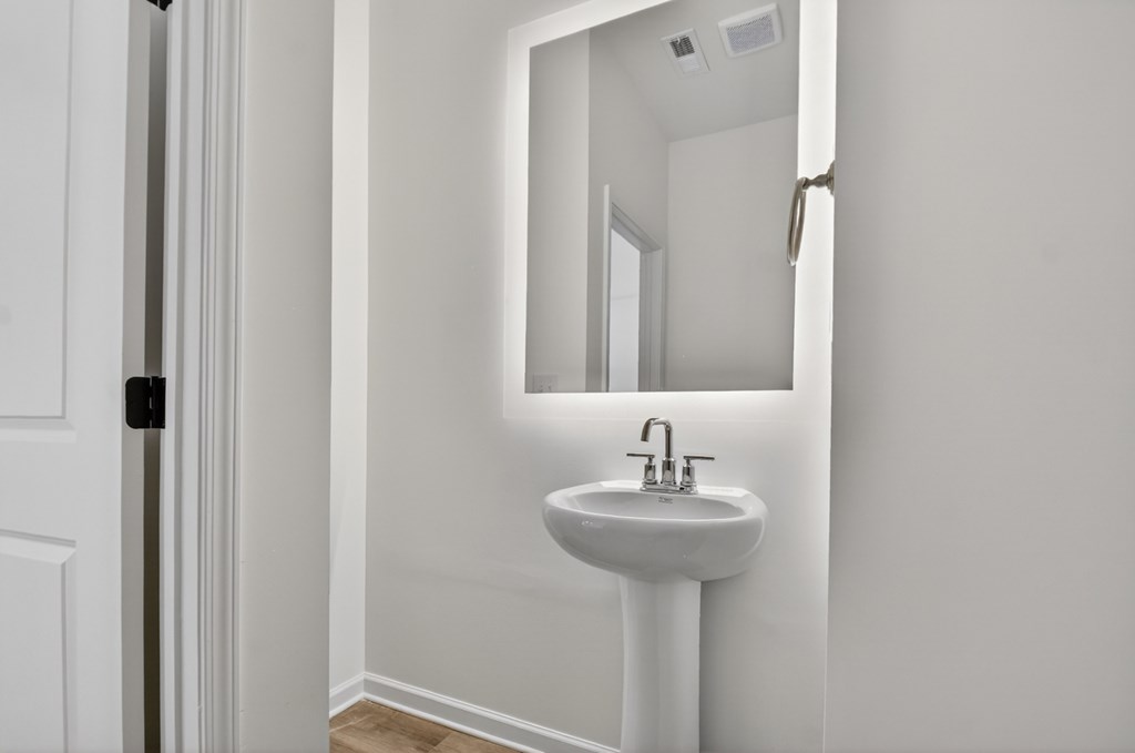 7 Grove Loop Blue Ridge, GA 30513 - Photo 21 of 33 a bathroom with a sink and a mirror