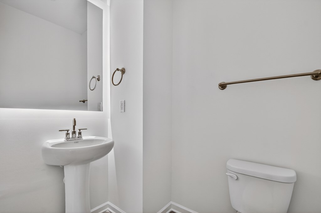 7 Grove Loop Blue Ridge, GA 30513 - Photo 22 of 33 a bathroom with a sink a toilet and shower
