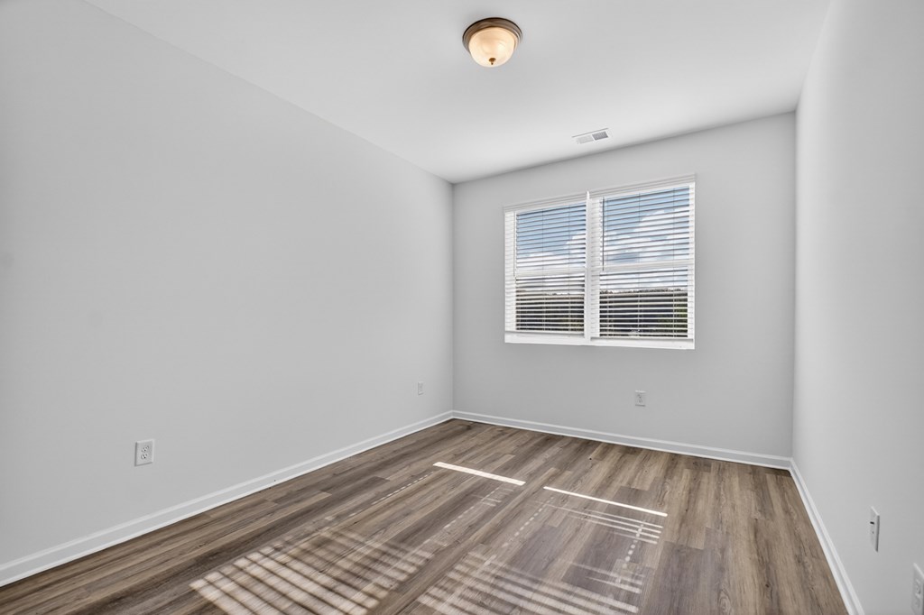 7 Grove Loop Blue Ridge, GA 30513 - Photo 23 of 33 a view of empty room with wooden floor