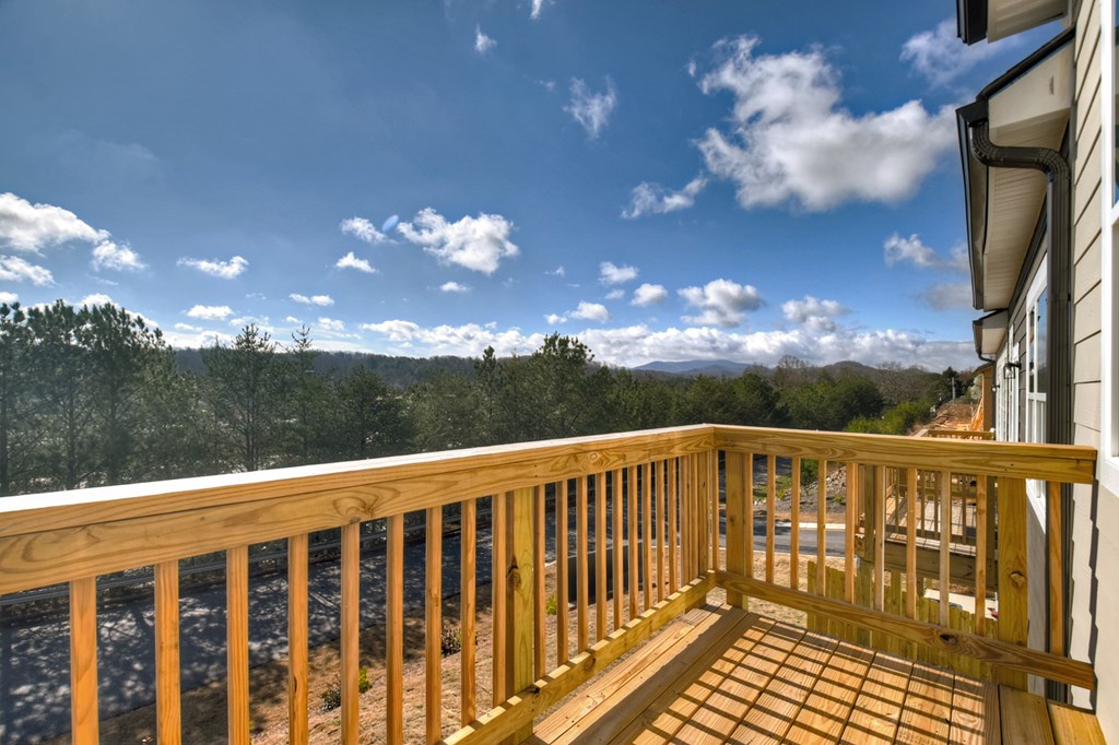 7 Grove Loop Blue Ridge, GA 30513 - Photo 27 of 33 a view of a balcony with wooden fence