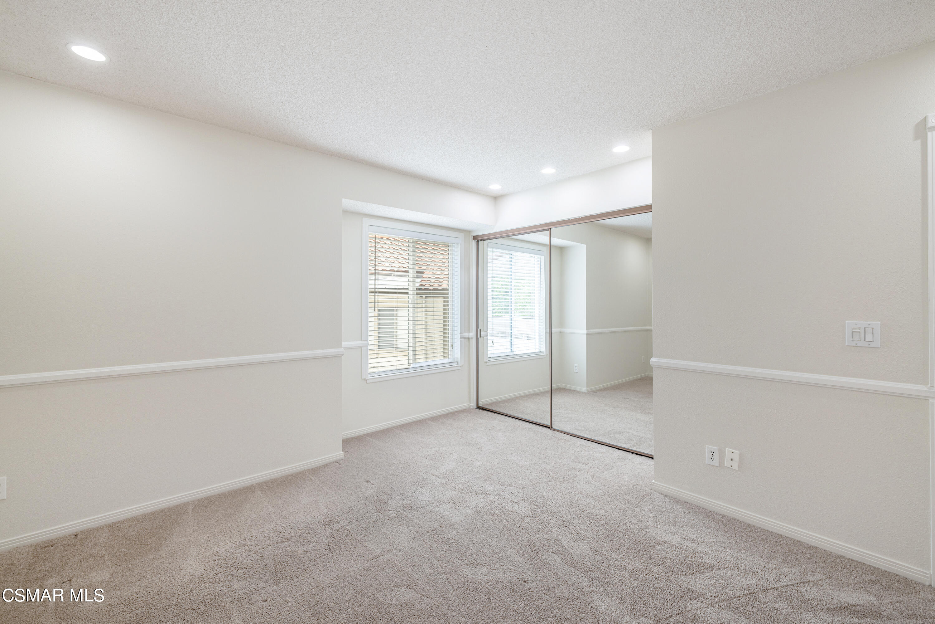3330 Darby Street, Unit 409 Simi Valley, CA 93063 - Photo 15 of 27 an empty room with windows