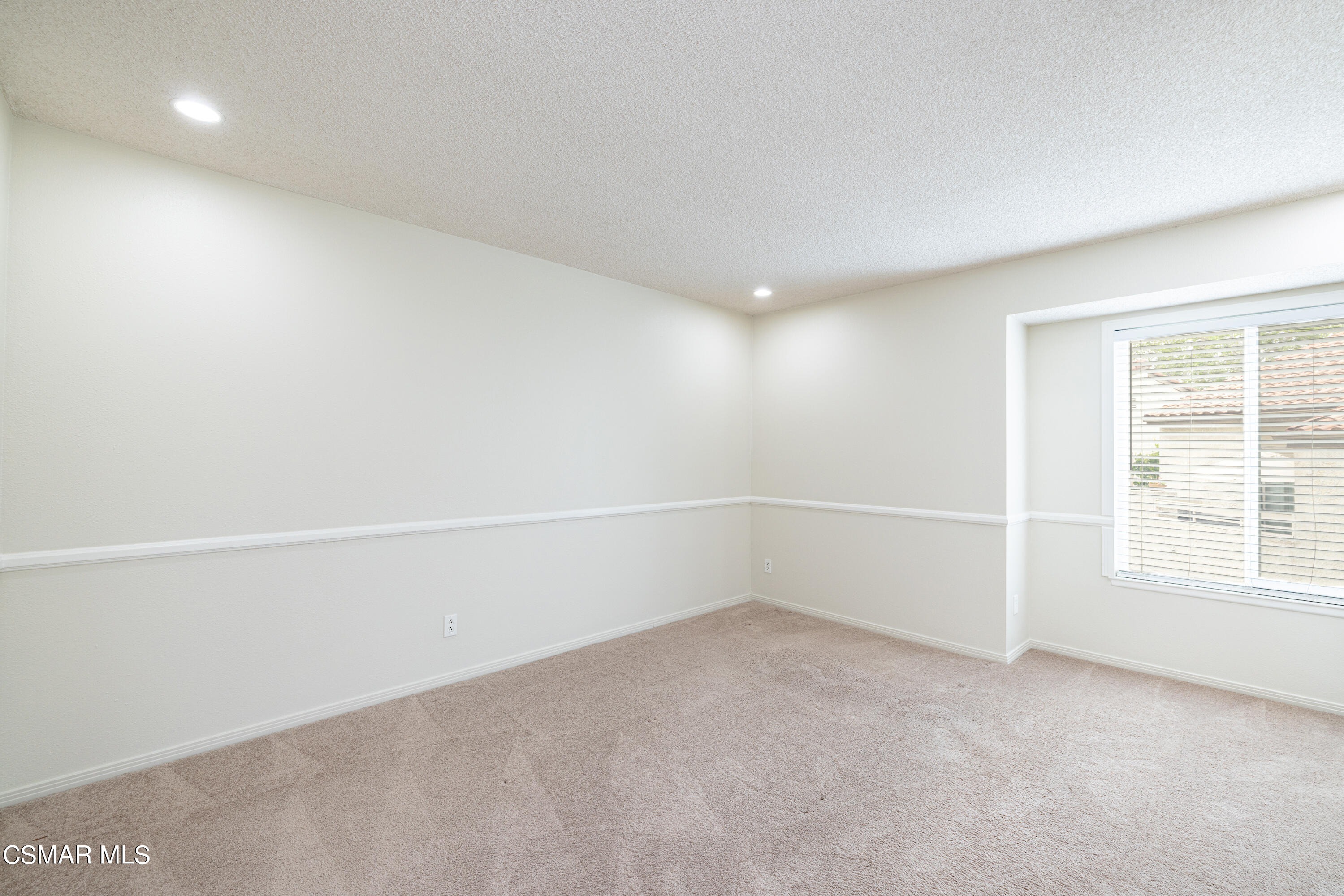 3330 Darby Street, Unit 409 Simi Valley, CA 93063 - Photo 16 of 27 an empty room with a empty space and windows