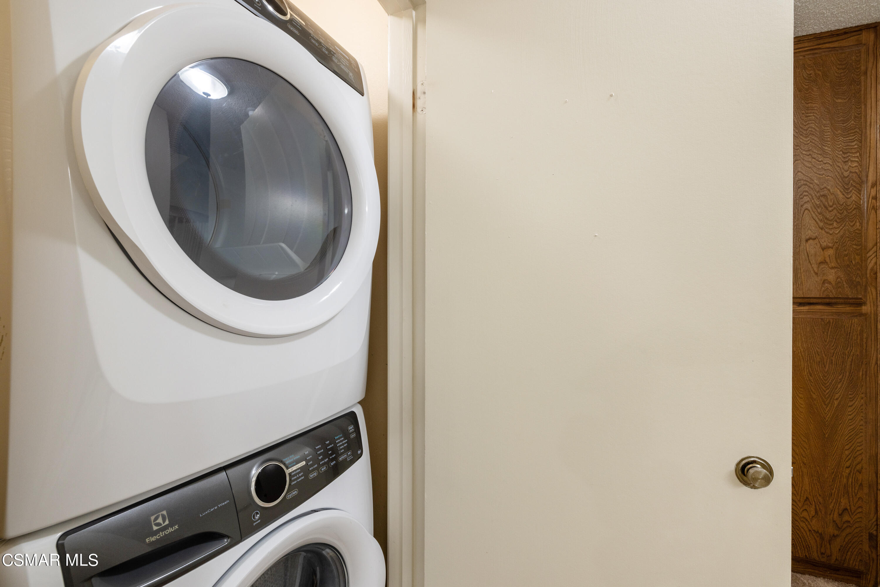 3330 Darby Street, Unit 409 Simi Valley, CA 93063 - Photo 19 of 27 a close up view of a washer and dryer
