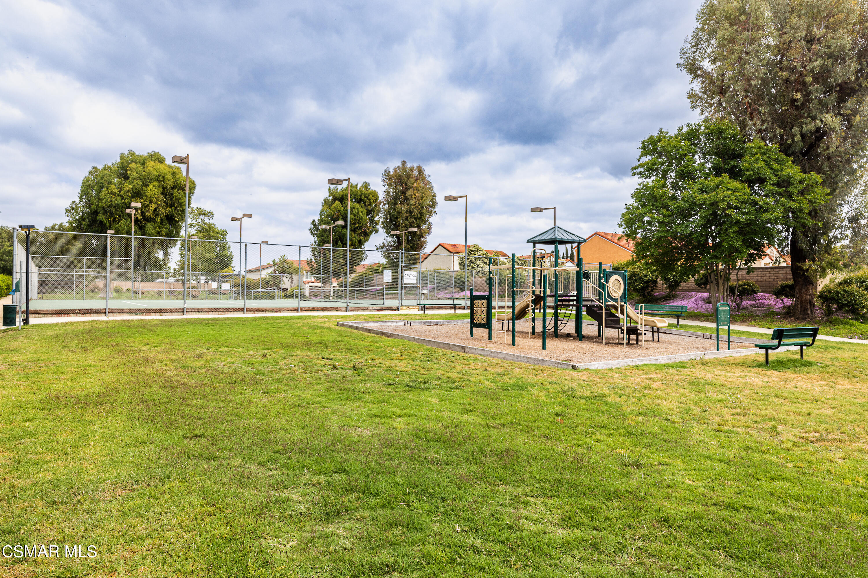 3330 Darby Street, Unit 409 Simi Valley, CA 93063 - Photo 25 of 27 a view of swimming pool with lawn chairs and iron fence