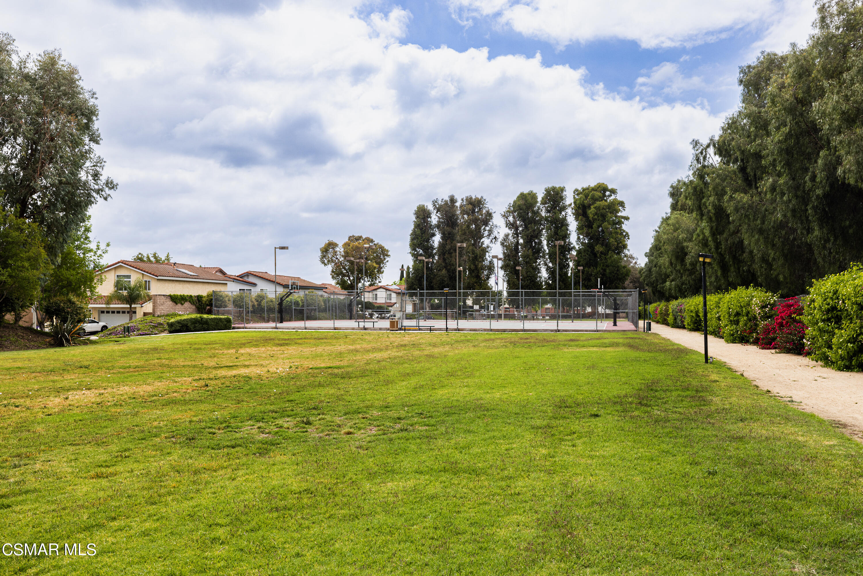 3330 Darby Street, Unit 409 Simi Valley, CA 93063 - Photo 26 of 27 a view of a swimming pool with an outdoor seating