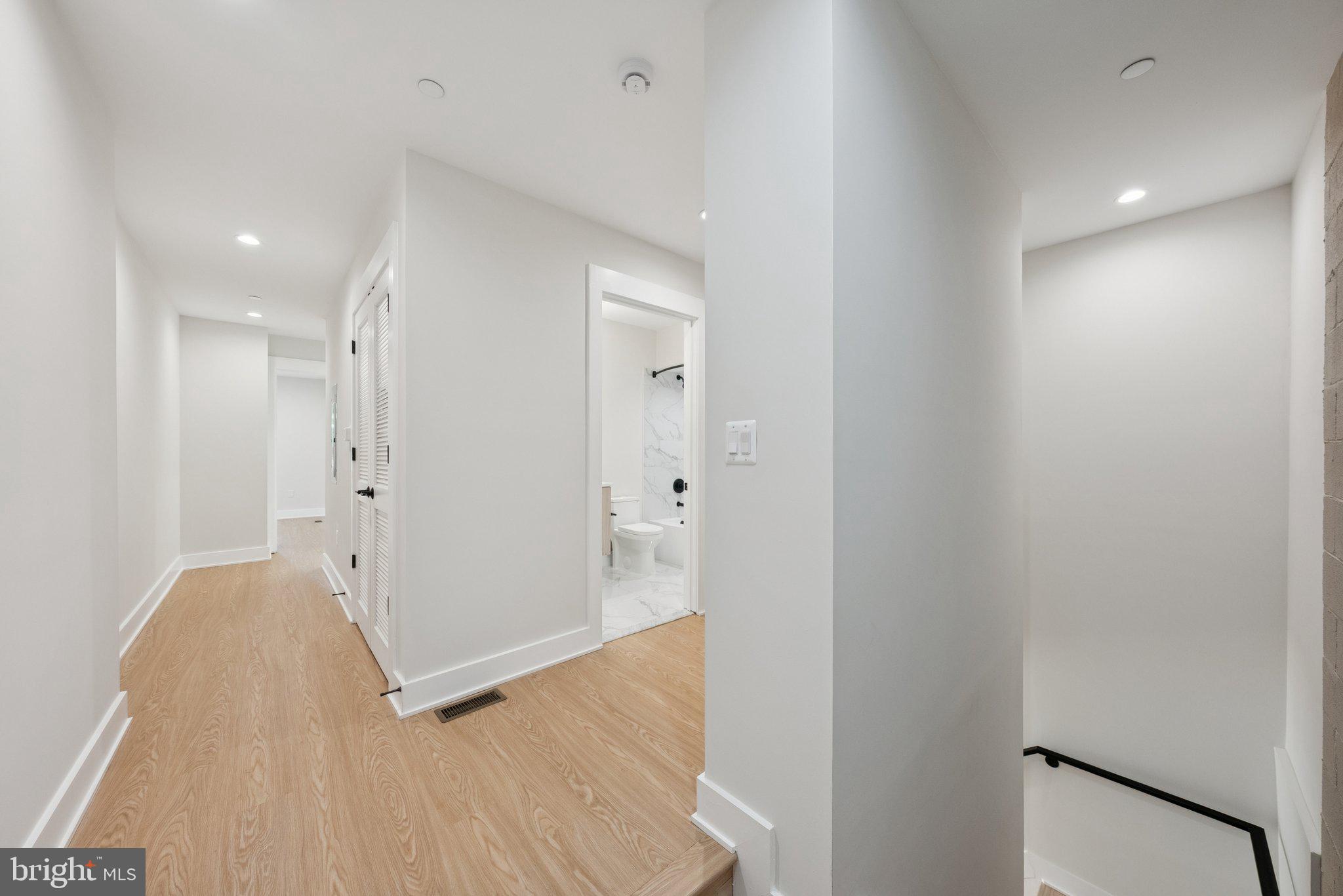 2134 Wisconsin Avenue Northwest, Unit 3 Washington, DC 20007 - Photo 15 of 40 a view of room with window and wooden floor