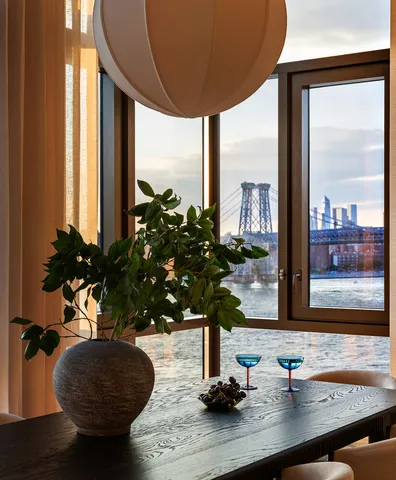 a kitchen with stainless steel appliances granite countertop a sink and a refrigerator