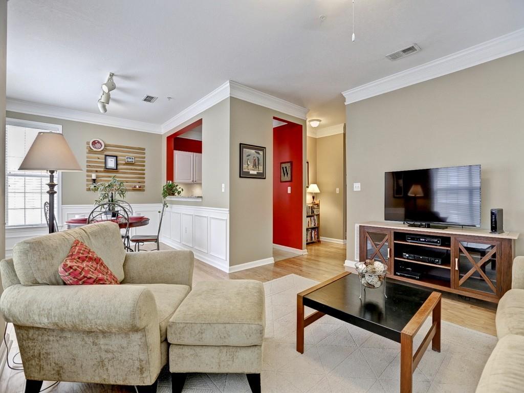 Spacious living room opens to the kitchen and dining area, making entertaining a breeze!