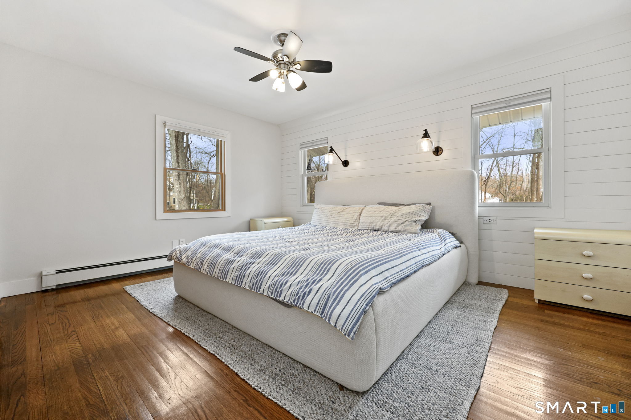 36 North Street Trumbull, CT 06611 - Photo 13 of 23 a spacious bedroom with a bed and a window