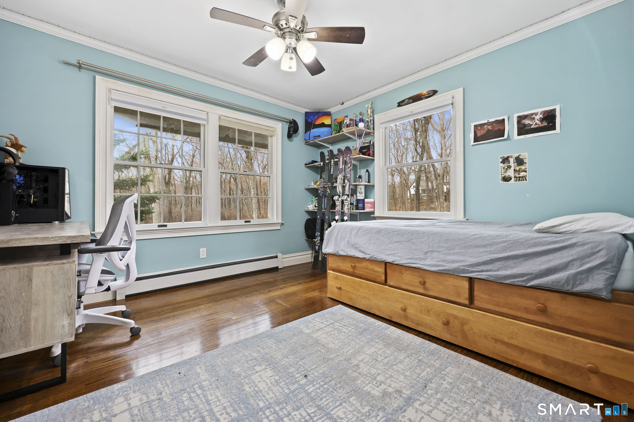 36 North Street Trumbull, CT 06611 - Photo 14 of 23 a bedroom with a bed and wooden floor