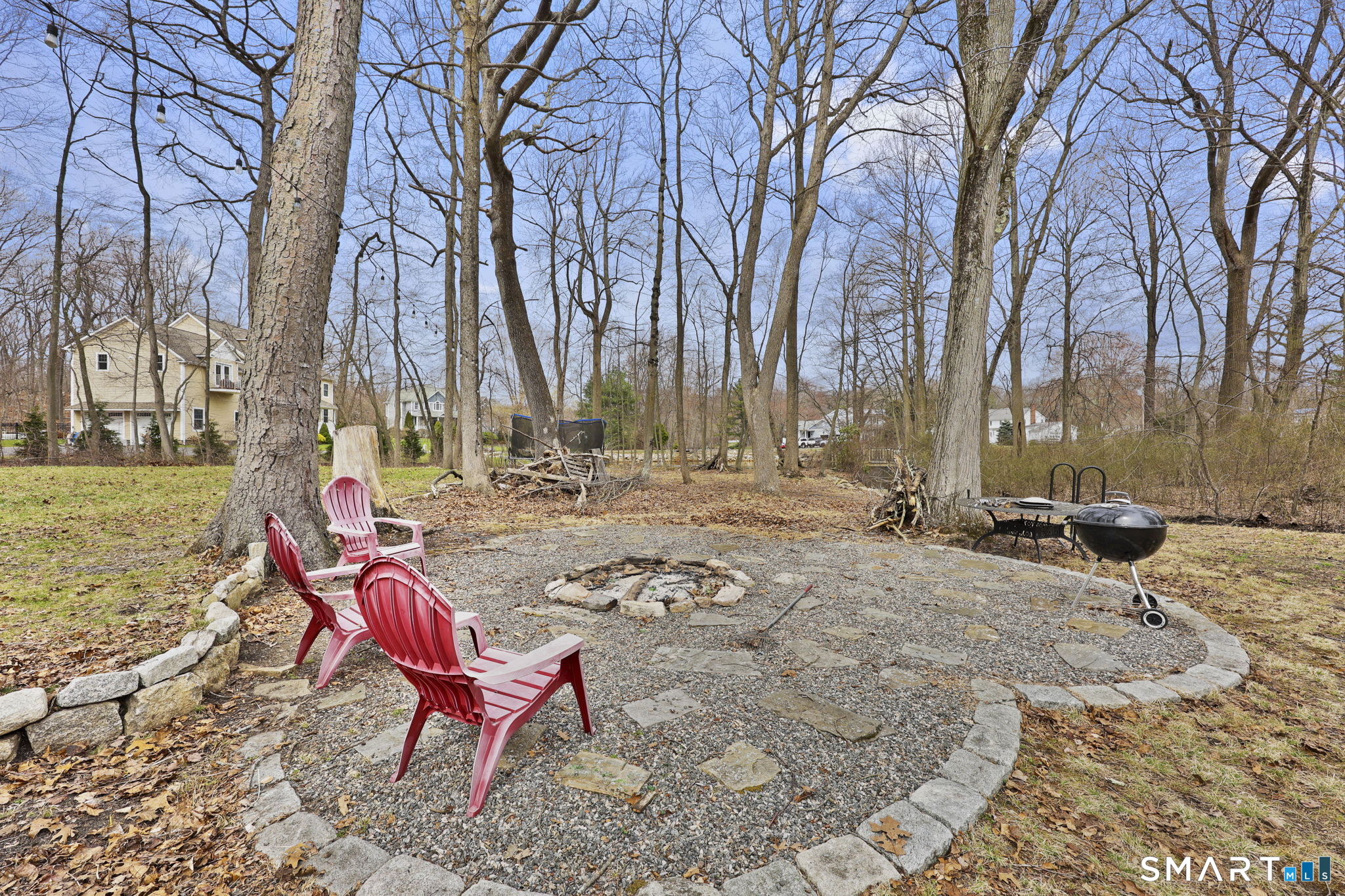 36 North Street Trumbull, CT 06611 - Photo 21 of 23 a view of a backyard with snow on the road