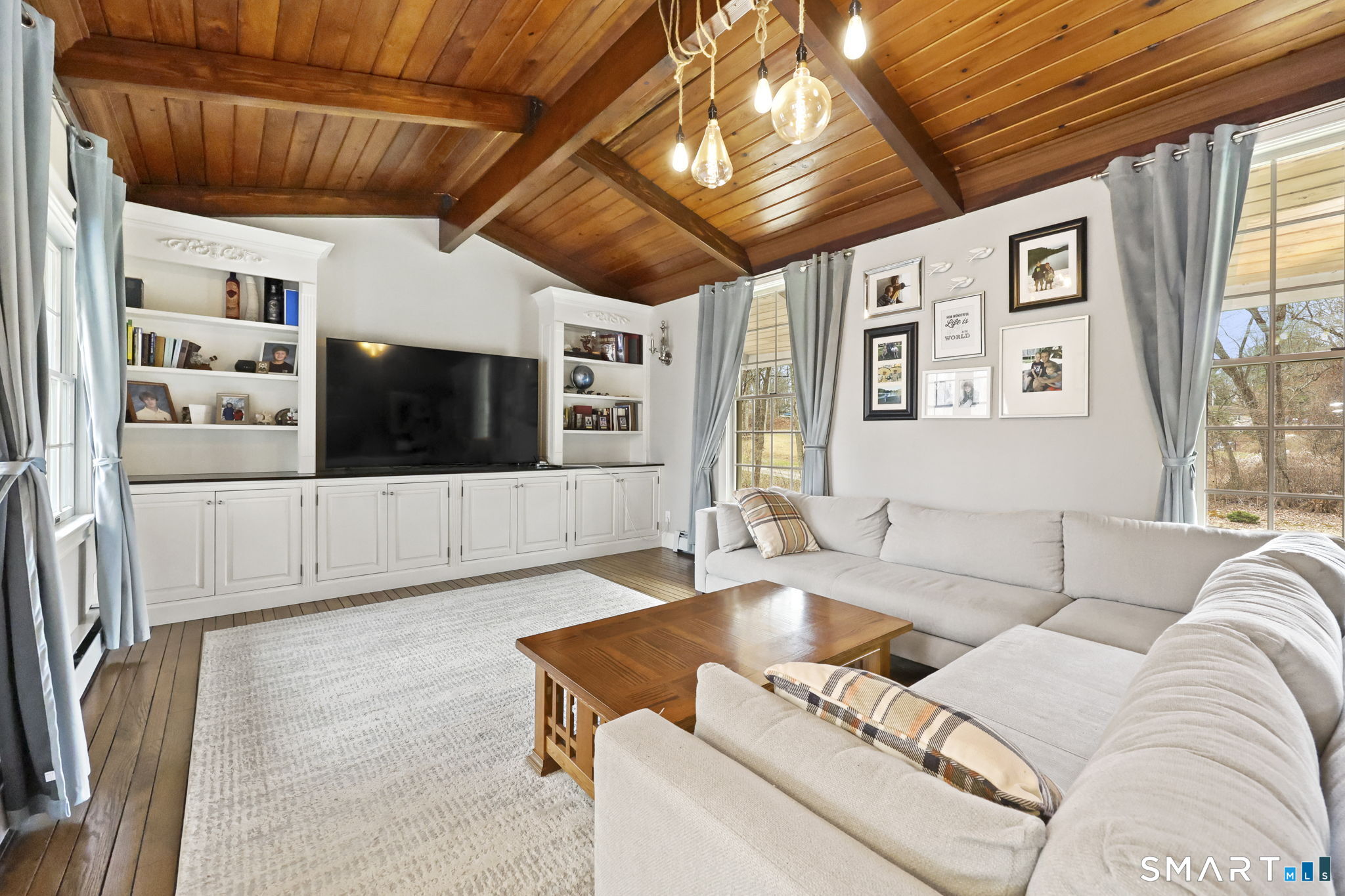 36 North Street Trumbull, CT 06611 - Photo 10 of 23 a living room with furniture and a flat screen tv