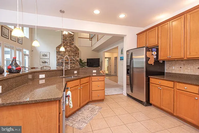 a bathroom with a sink a mirror and a shower