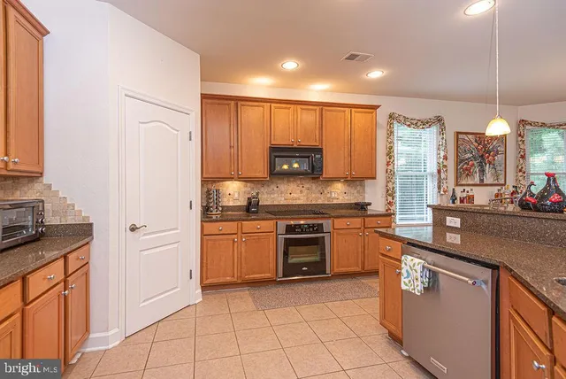 a view of a bedroom from a hallway