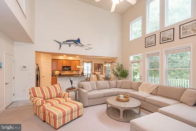 a spacious bathroom with a sink mirror and a bathtub
