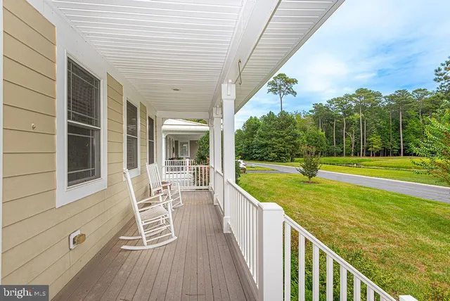 a view of a chairs and table in the terrace