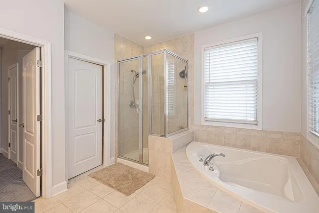 a view of a chair and table in the balcony