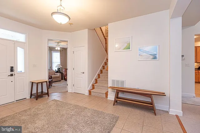 a view of a lake with boats and trees in the background
