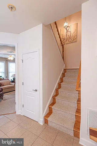 a view of a lake with boats and trees in the background