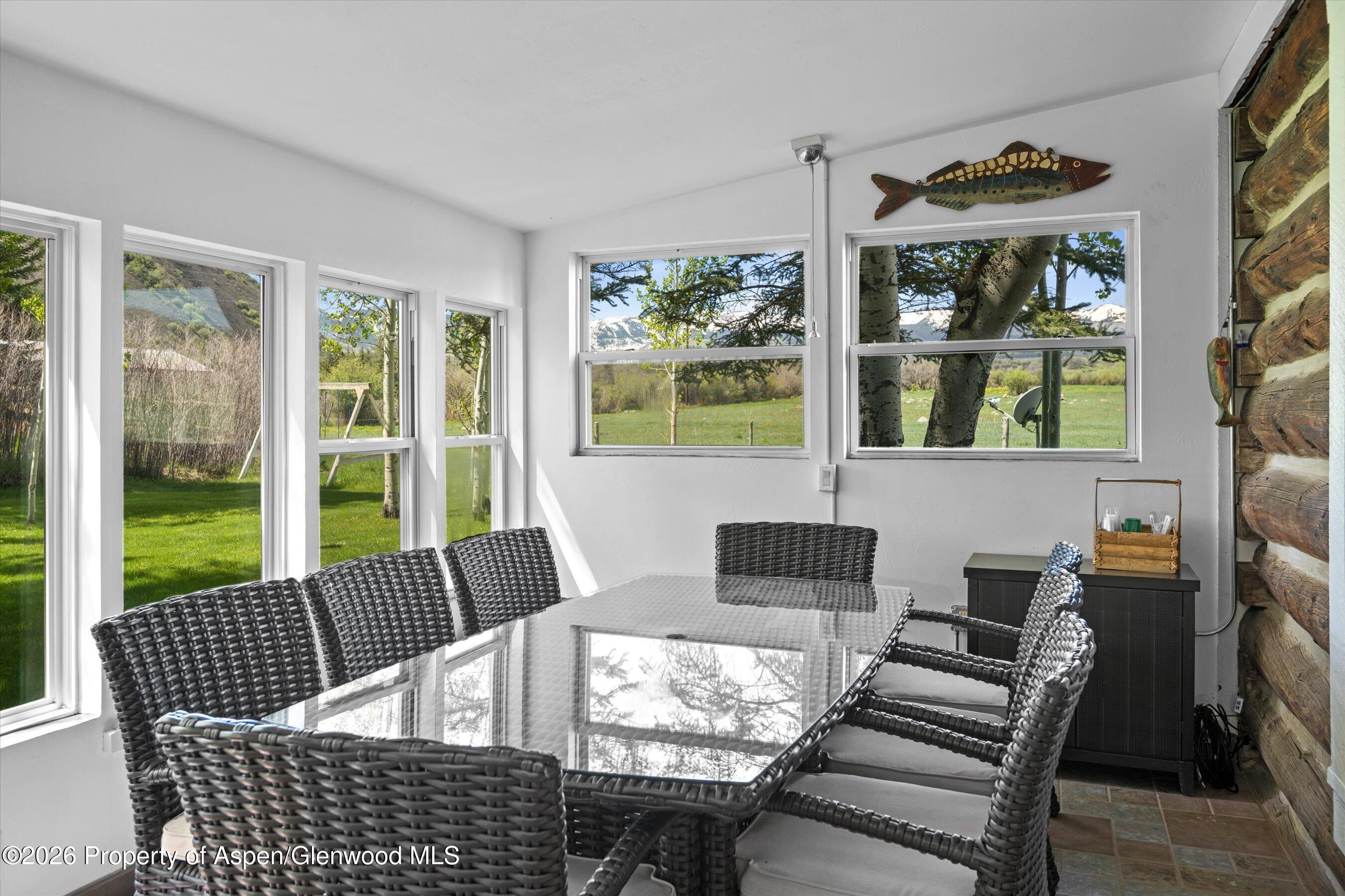 1645 Capitol Creek Road Snowmass, CO 81654 - Photo 14 of 51 Sunroom dining area