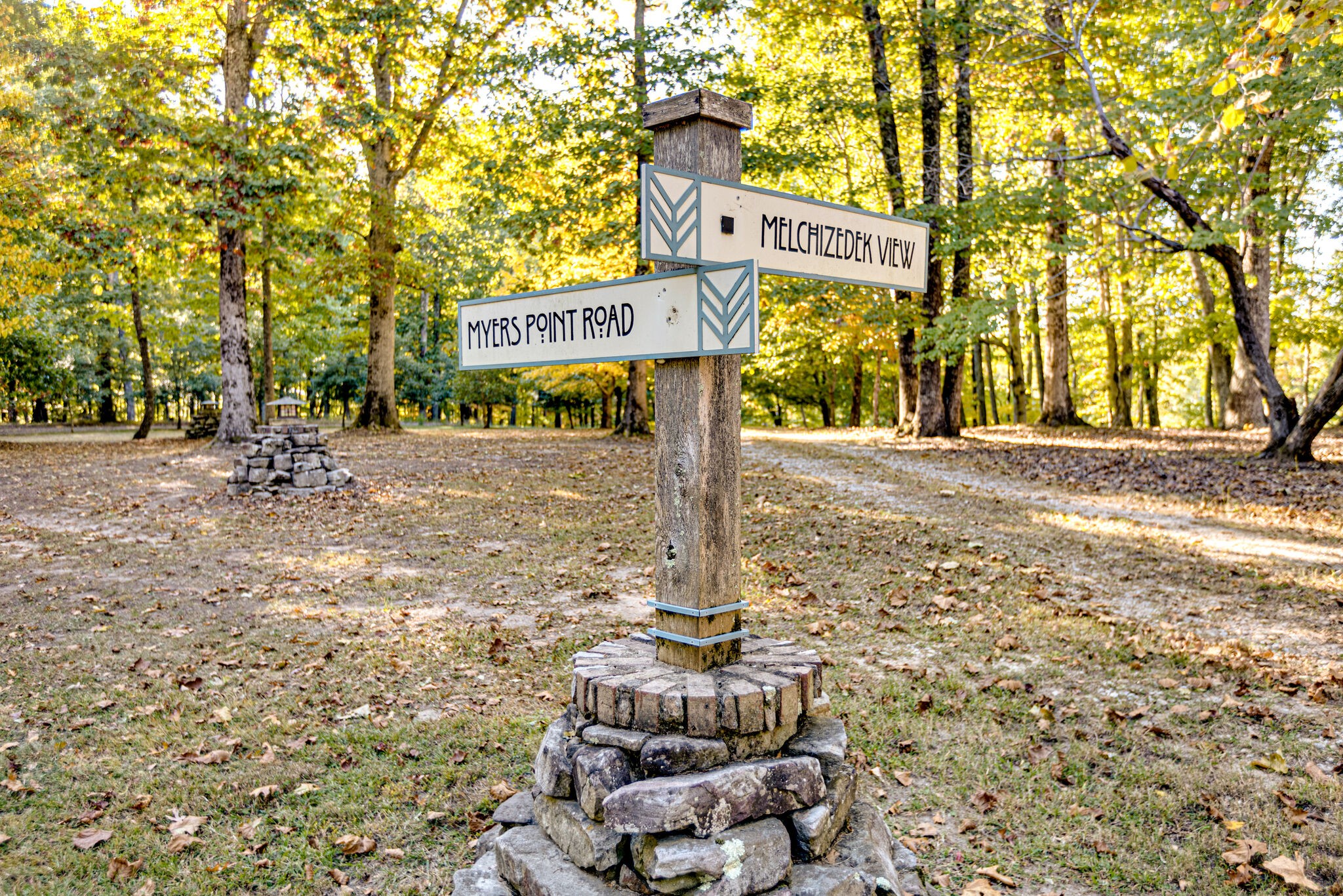15 Myers Point Road Sewanee, TN 37375 - Photo 2 of 23 a street sign on a sidewalk next to a road