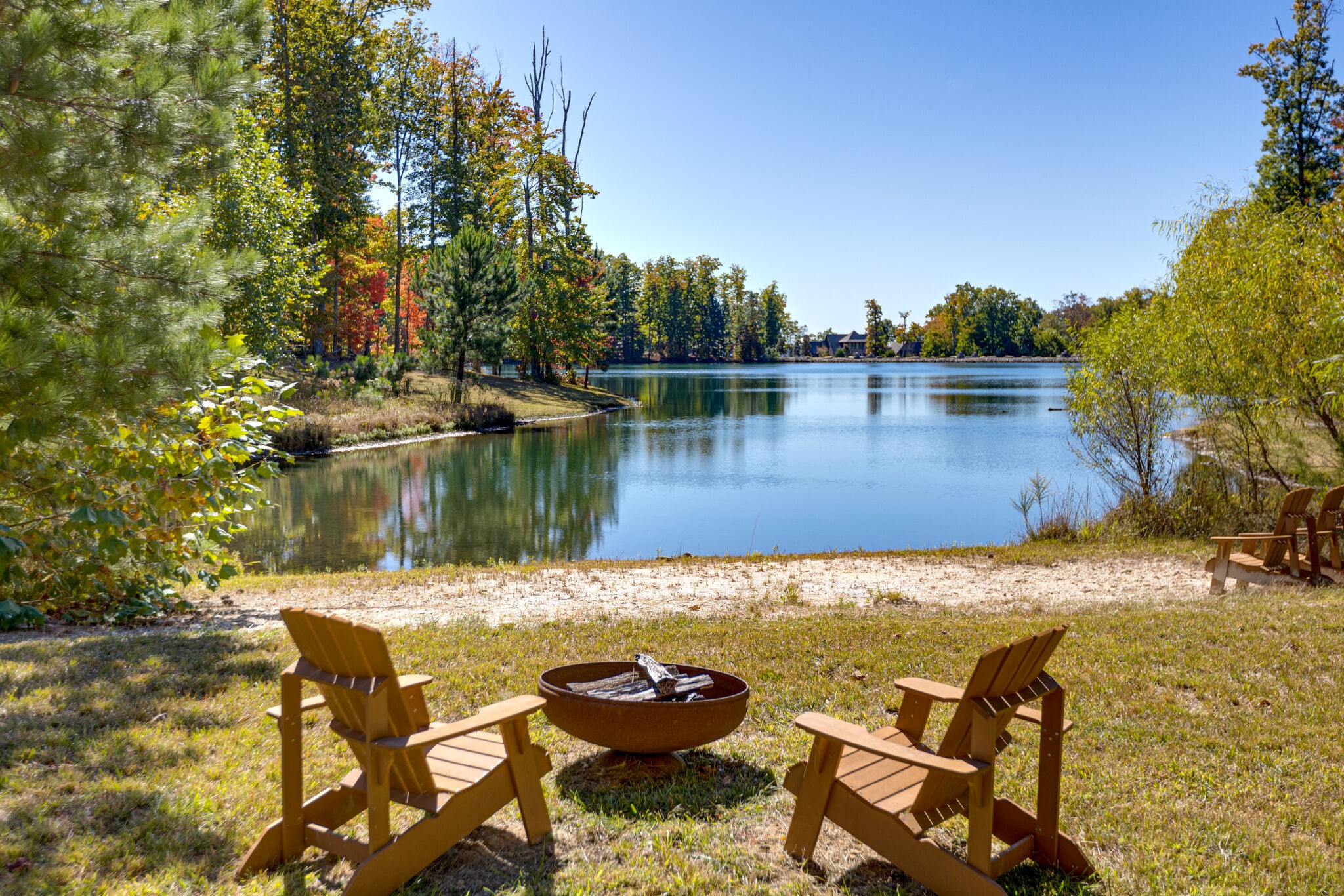 15 Myers Point Road Sewanee, TN 37375 - Photo 9 of 23 a view of a lake with couches and wooden fence