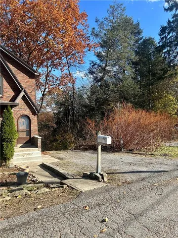 a view of a house with a snow