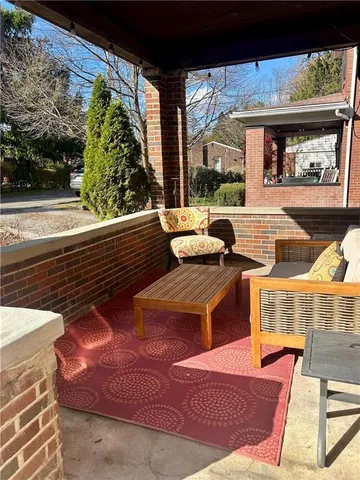 a view of an outdoor sitting area with a couch